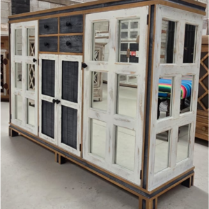 Coco Bay Buffet Cabinet with whitewashed finish, glass windowpane doors, black accent panels, and storage drawers